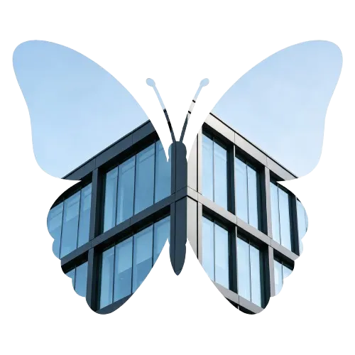 Butterfly silhouette filled with a modern coated building facade