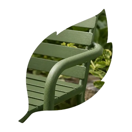 Leaf silhouette filled with green powder-coated outdoor furniture