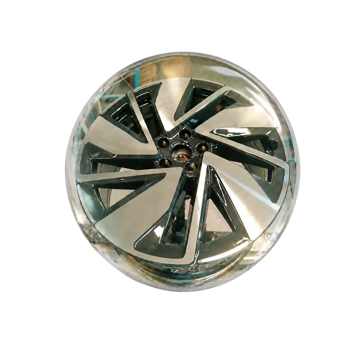 Automotive wheel enclosed in a transparent glass sphere