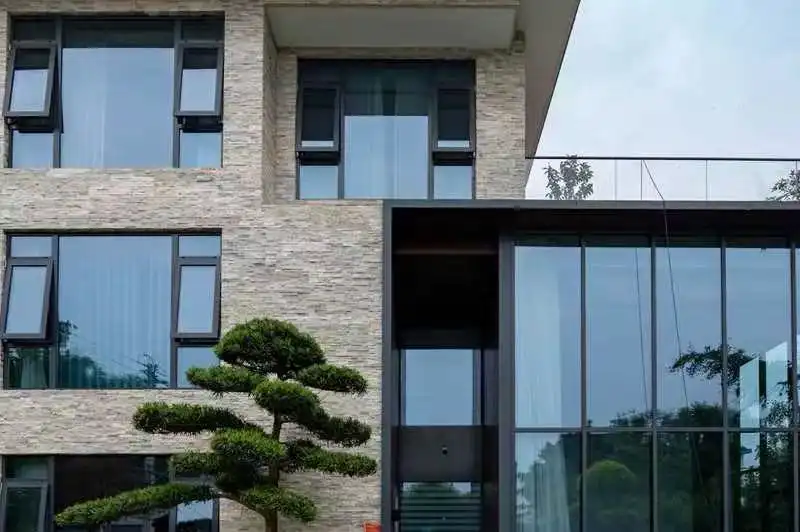 Dark grey window and door facade