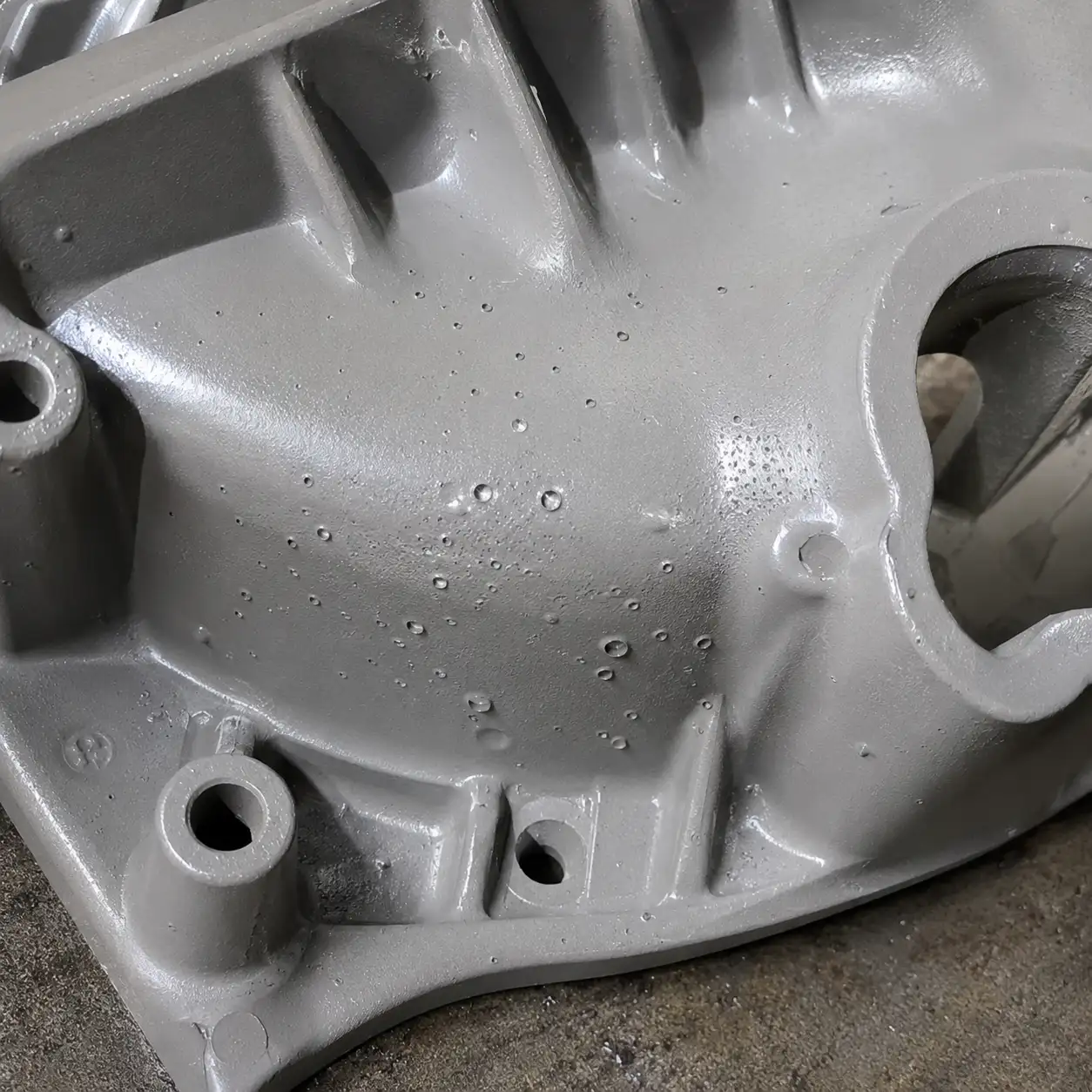 Outgassing from Die Castings: Outgassing blisters require preheating and controlled powder reactivity.