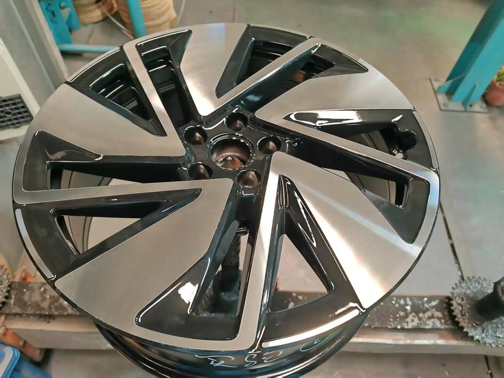 Precision machining a coated wheel
