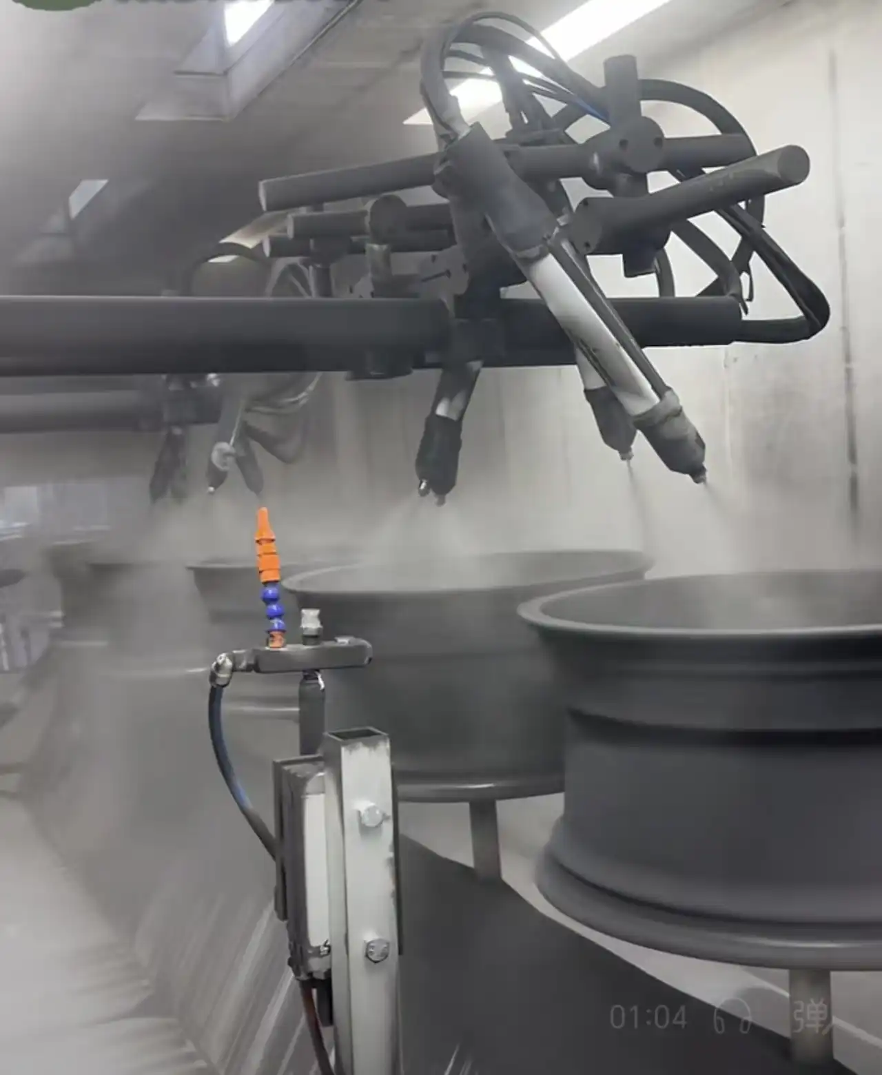 Dark-colored wheels on an automated coating line