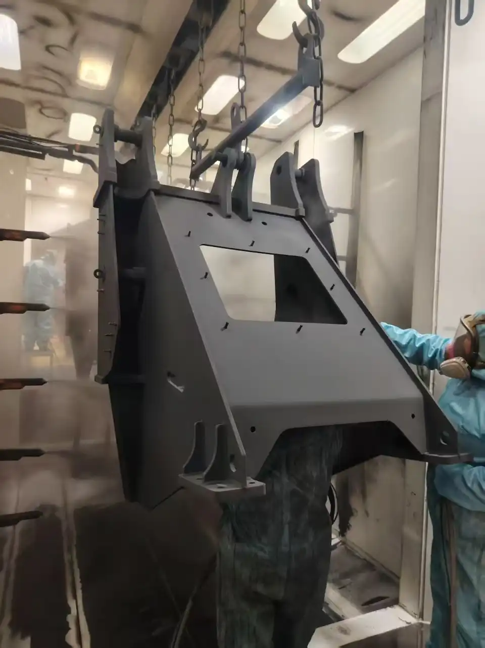 Large construction equipment component coating