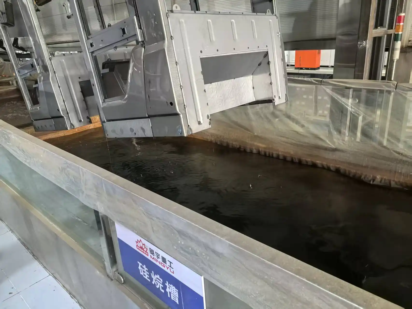Yellow equipment components on coating line