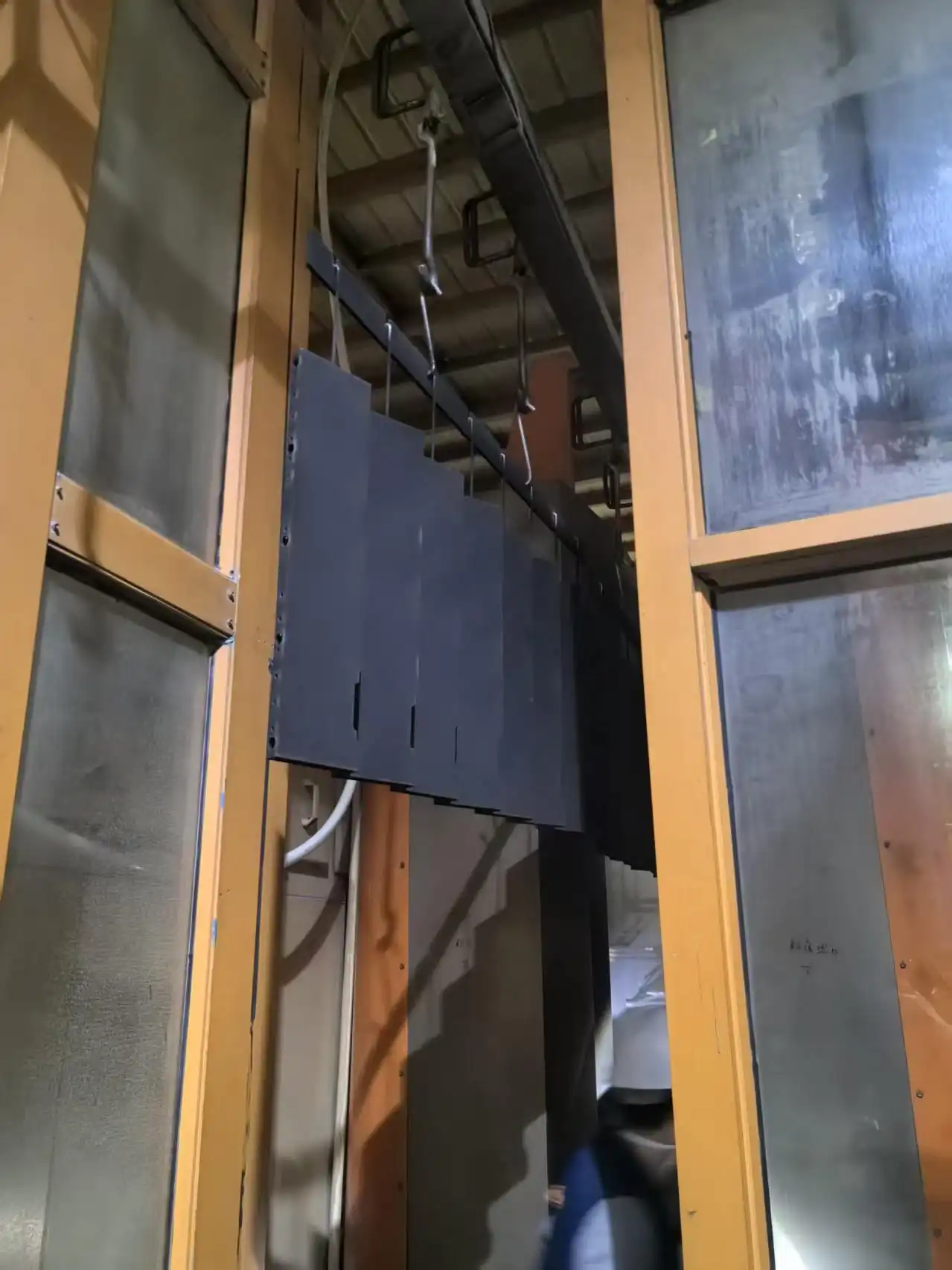 Black coated parts in hanging-line production