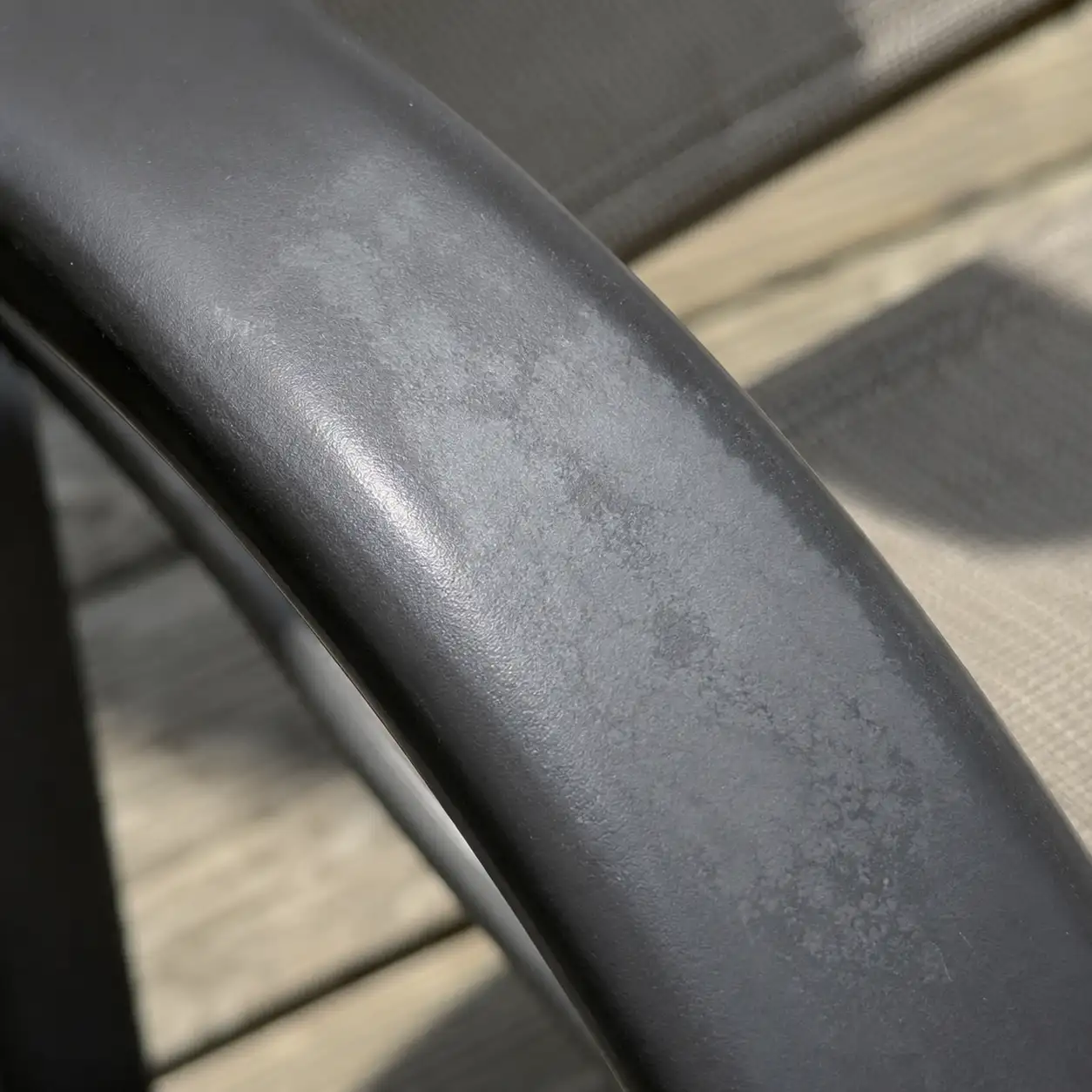 Gloss Loss and Whitening from Perspiration and Sunscreen: Chemical contact can whiten the surface, requiring better chemical resistance and long-term exposure testing.