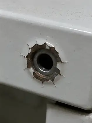 Coating Chipping Around Fastener Holes: The coating cracks, lifts or detaches around holes after fastening.